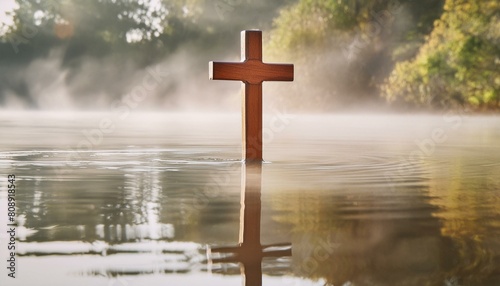 The Wooden Christian Cross In The Misty, Foggy Water.