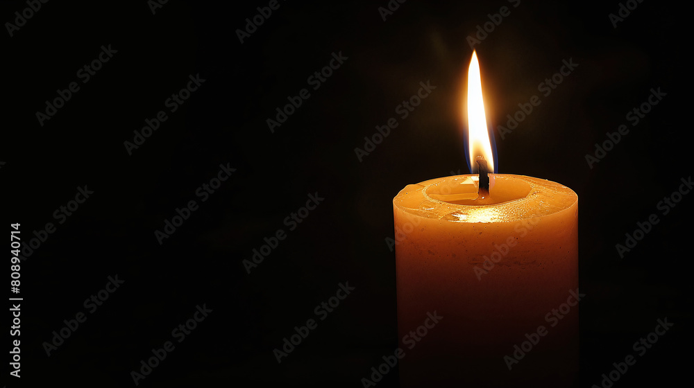 Glowing Single Candle with Bright Flame on Dark Background Symbolizing Hope and Remembrance Glowing Single Candle with Bright Flame on Dark Background Symbolizing Hope and Remembrance