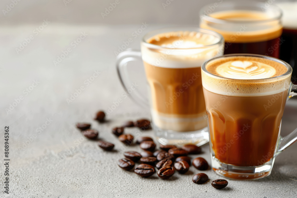 Assortment of fresh brewed coffee in glass cups. Different types of coffee background. Assortment of fresh brewed coffee in glass cups. Different types of coffee background.