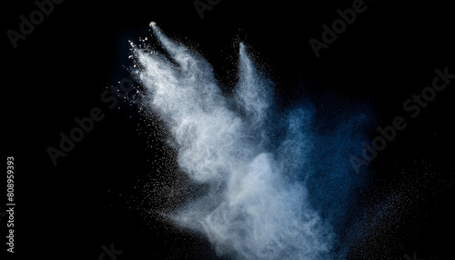 Motion freeze highlights white particles on black background