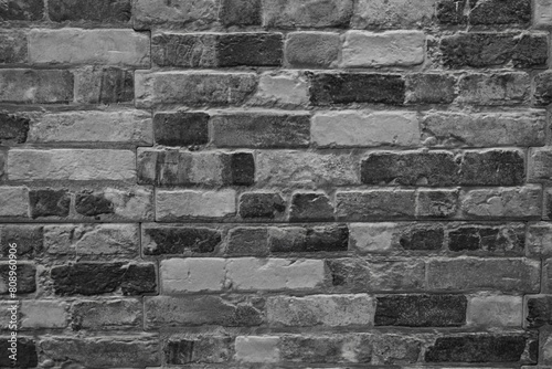 Black And White Photo Of A Brick Wall