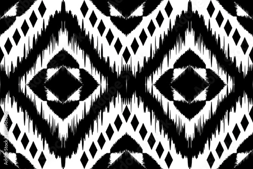 Modern Ikat geometric folklore ornament with diamonds. Tribal ethnic vector texture. seamless striped pattern in Aztec style. Folk embroidery. Indian. Scandinavian. Gypsy. African rug.