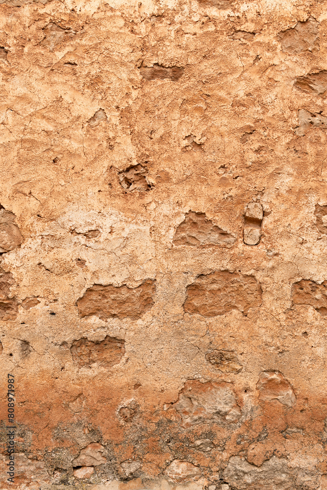 Detailed structure of an old weathered ochre-colored Mediterranean wall - 8814 Detailed structure of an old weathered ochre-colored Mediterranean wall - 8814