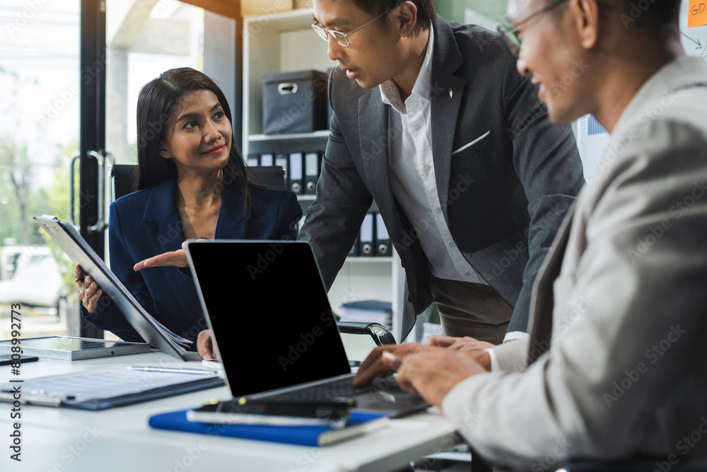 Business corporate team brainstorming, planning strategy having a discussion Analysis investment researching with chart at office desk documents in office. Business corporate team brainstorming, planning strategy having a discussion Analysis investment researching with chart at office desk documents in office.