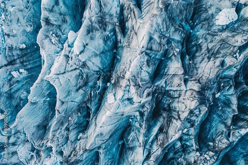 textured surface of massive vatnajökull glacier in iceland on winter day aerial drone photography