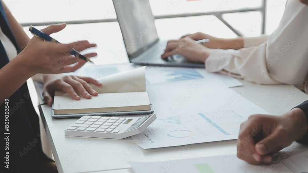 Business team colleague working with new startup project plan and discussion information for financial strategy with laptop, results of their successful teamwork. Business team colleague working with new startup project plan and discussion information for financial strategy with laptop, results of their successful teamwork.