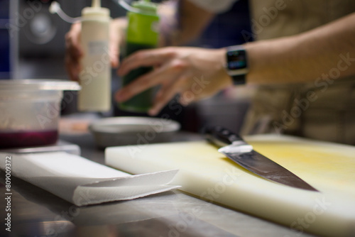 person preparing food in kitchen