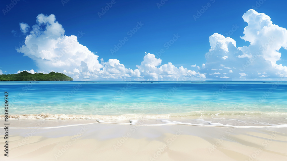 Fototapeta premium A beautiful beach with a clear blue ocean and a few small islands in the distance. The sky is mostly clear with a few clouds scattered throughout. The scene is peaceful and serene, with the calm ocean