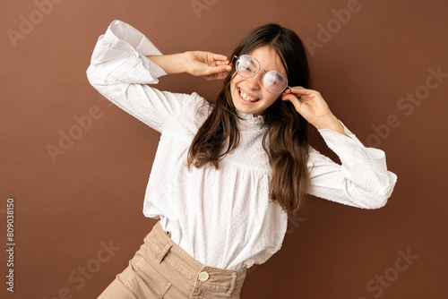 Smiling happy girl with her new glasses