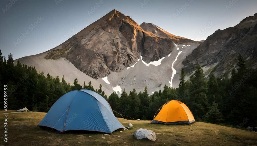 A mountain icon with a tent pitched at its base