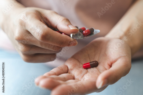 Healthcare Harmony: Close-Up Hands Holding Medication and Water Glass for Optimal Wellness, Pharmaceutical Treatment and mental health treatment