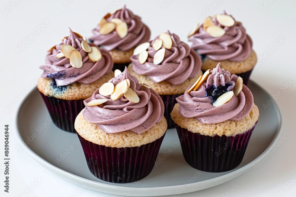 Almond Cupcakes with Blueberry Tequila Filling and Marzipan Topping Almond Cupcakes with Blueberry Tequila Filling and Marzipan Topping