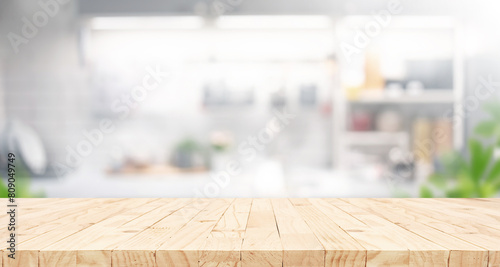 Selective focus.End grain wood counter,table top on blur kitchen counter in morning background.For montage product display o
