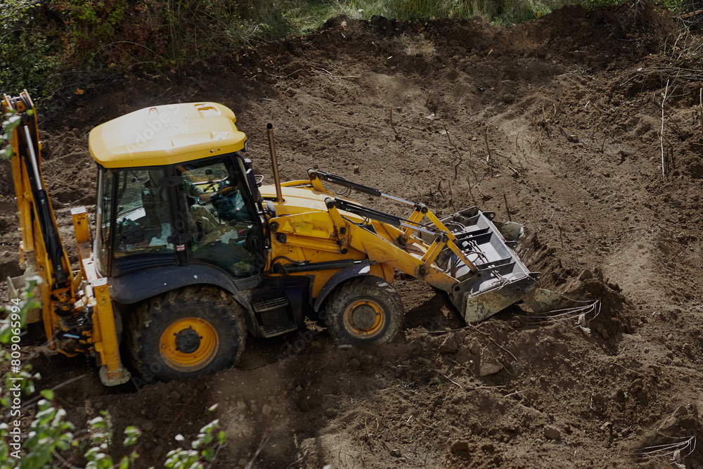 Bulldozer leveling the ground at a construction site, bulldozer work, leveling the ground at the construction site, bulldozer earthworks Bulldozer leveling the ground at a construction site, bulldozer work, leveling the ground at the construction site, bulldozer earthworks