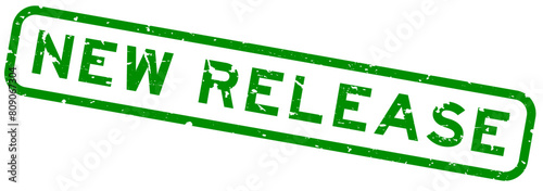 Grunge green new release word rubber seal stamp on white background