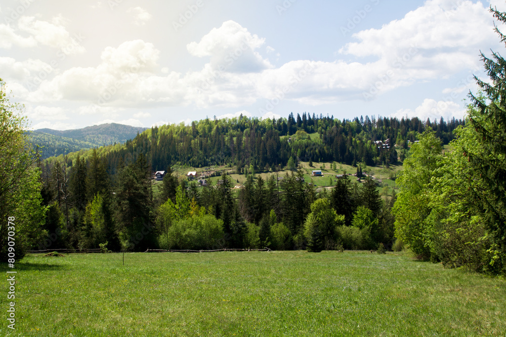 Mountain village. Hills, mountains, green nature.