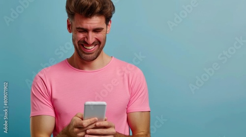 Man Enjoying Messaging on Phone. © RanoStudio