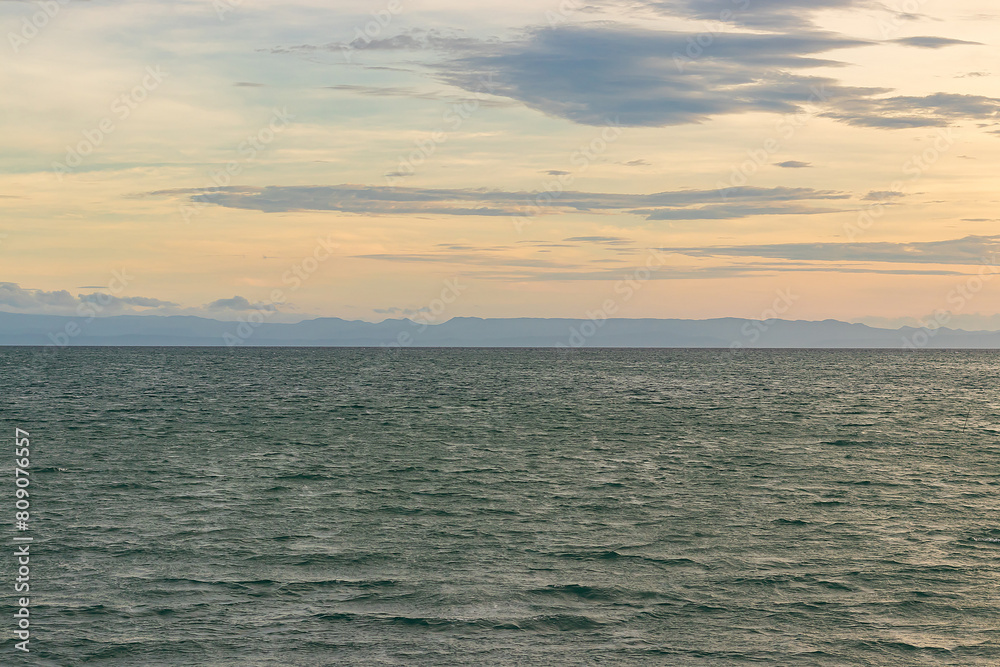 Nature daylight and blue sky with white clouds floating on at morning over the sea. Nature daylight and blue sky with white clouds floating on at morning over the sea.