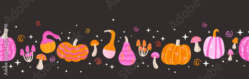Pink and orange magic halloween seamless pattern with pumpkins, mushrooms and stars. Vector illustration © TALVA