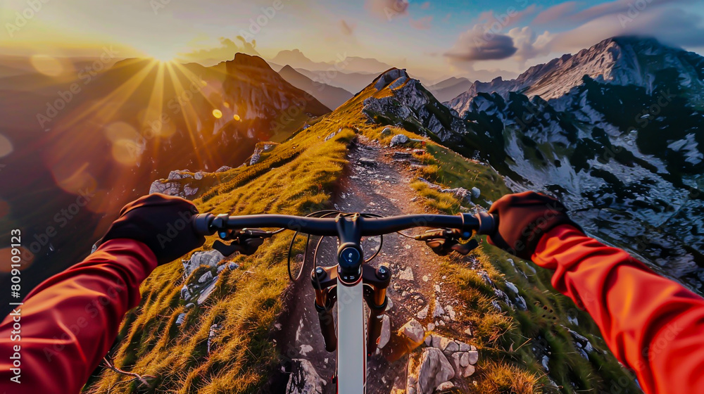 Fototapeta premium Mountain Biking at Sunrise on Alpine Trail