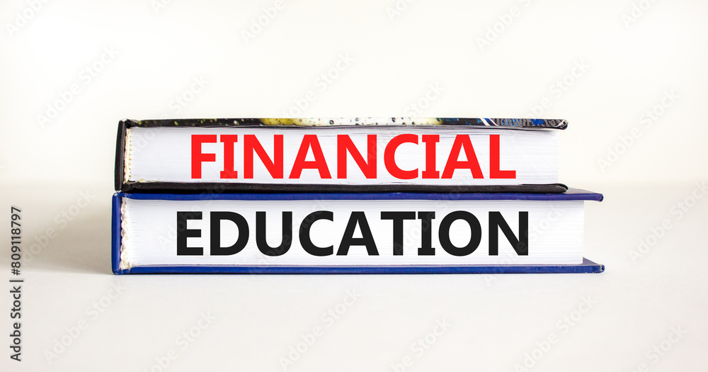 Financial education symbol. Concept words Financial education on beautiful books. Beautiful white paper background. Business Financial education concept. Copy space.