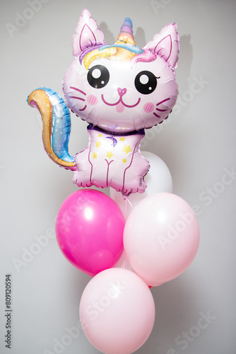 pink cat balloons and pink foil 
