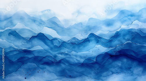 A blue ocean with mountains in the background