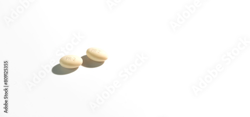 Banner Isolated Progesterone Pill, Capsules During Pregnancy On White Background. Dose Of Medications treats irregular menstrual cycle, prevents thicknessing the lining of uterus, Horizontal Copyspace