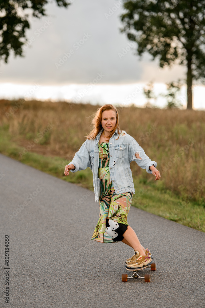 Beauty in motion: young girl's longboard journey viewed. Beauty in motion: young girl's longboard journey viewed.