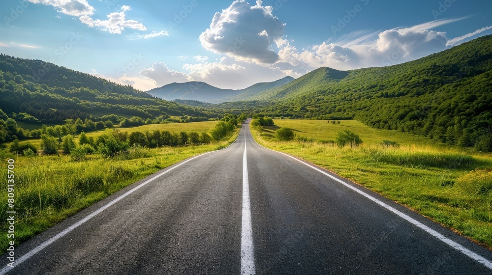 Fototapeta premium A road in a hilly landscape.