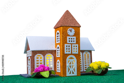 On a white background, a small chapel and flowers around