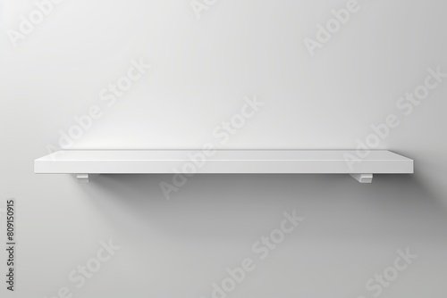 Empty white wall shelf mounted on a gray wall providing a minimalist and clean look for modern interior design photo