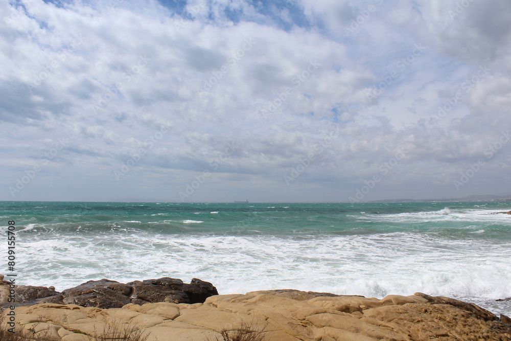waves on the beach, the coast of the mediterranean sea. waves on the beach, the coast of the mediterranean sea.