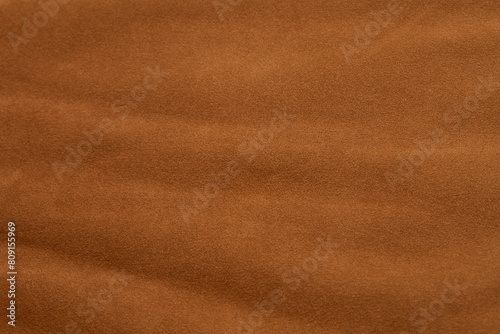 Vintage soft suede sofa. Mid-century modern couch. Close-up detail photograph. photo
