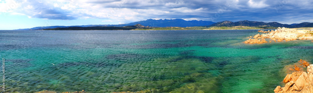 Tonnara Beach located in the Bouches de Bonifacio nature reserve in Corsica (Island of Beauty). Its waters are translucent, and thanks to the Tonnara islets, it creates a sort of fairly calm lagoon