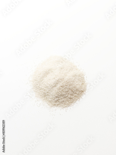 Isolated Celtic Gray Sea Salt On White Background, Vertical Plane. Top View. Natural And Unrefined Salt Harvested From Brittany, France. Superfood, Dieting. Natural Minerals And Trace Elements