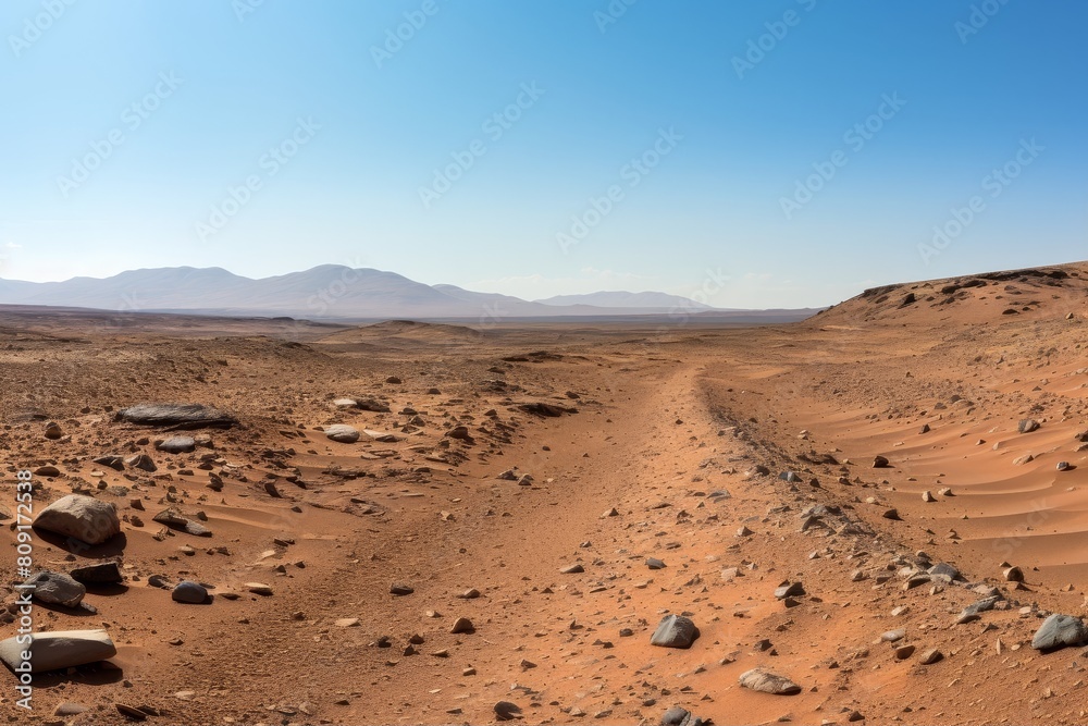 Vast desert landscape with mountains in the distance Vast desert landscape with mountains in the distance