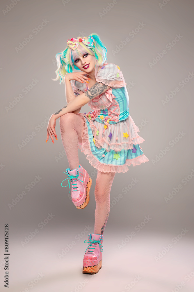 Pretty female clown model in colorful outfit and hair Pretty female clown model in colorful outfit and hair