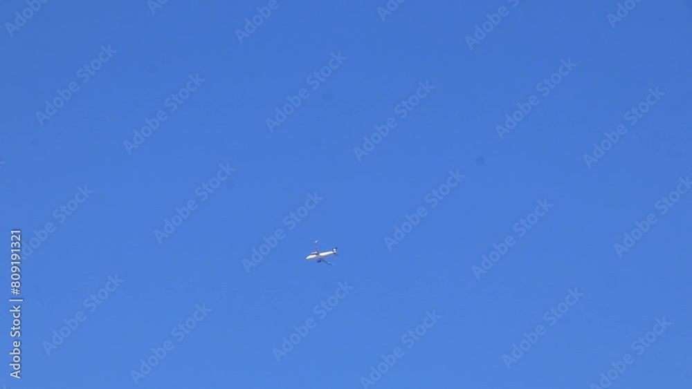 Plane flies over Puerto Escondido Mexico with blue sky. Plane flies over Puerto Escondido Mexico with blue sky.
