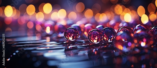 abstract background with colorful bokeh defocused lights and glass balls photo
