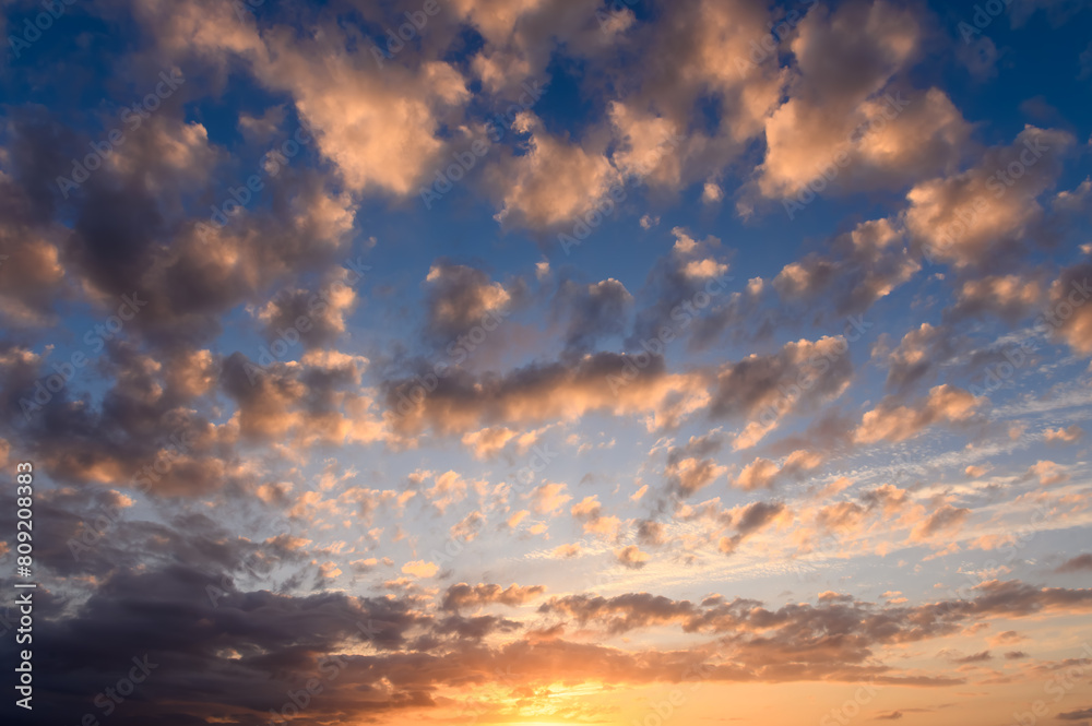 Dramatic Colorful Sunset Sky over Mediterranean Sea. Clouds with Sunrays.