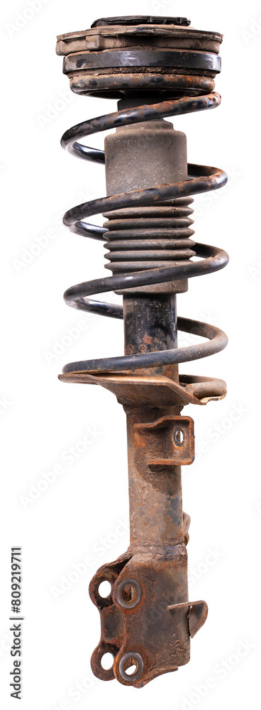 Old shock absorber with a spring from a passenger car on an isolated background. Old shock absorber with a spring from a passenger car on an isolated background.