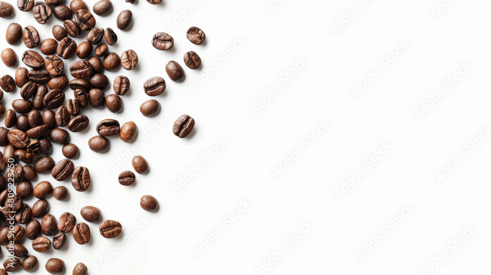 Top view of scattered coffee beans, isolated on a white background with space for text Top view of scattered coffee beans, isolated on a white background with space for text