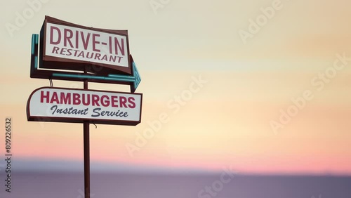 A Flashing Retro Vintage Sign For A Drive-In Diner Or Restaurant In The Californian Desert (Looping)