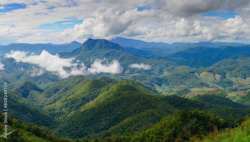 amazing wild nature view of layer of mountain forest landscape with cloudy sky natural green scenery of cloud and mountain slopes background maehongson thailand panorama view