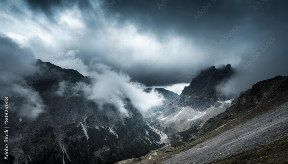 dark mountains with heavy clouds