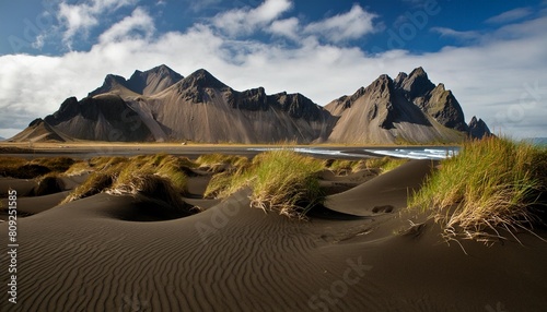 sand dunes on the stokksnes on southeastern icelandic coast with vestrahorn batman mountain iceland europe photo