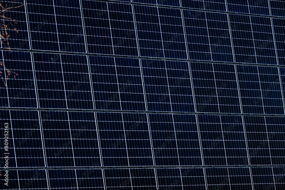 Multiple Solar panels on a warehouse wall. Multiple Solar panels on a warehouse wall.