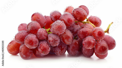 A cluster of ripe red grapes with dew, isolated on a white background 