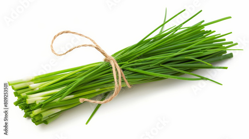 A bundle of fresh chives tied with twine, isolated on a white background 
